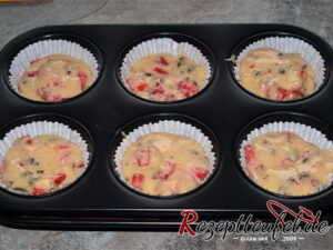 Teig in den Muffinförmchen